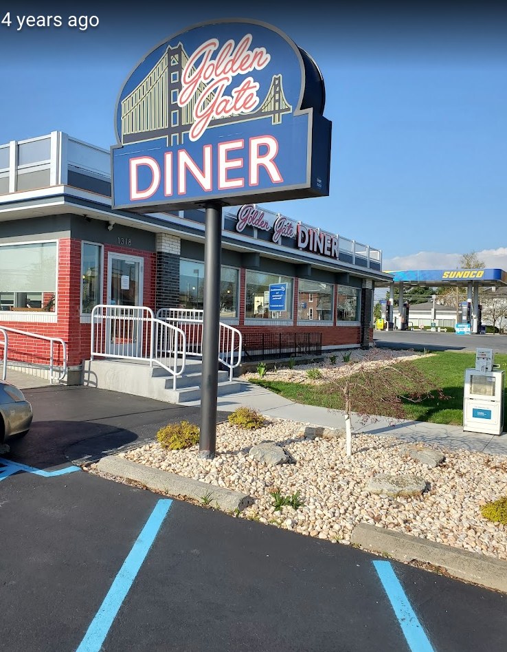 Golden Gate Diner exterior and roadside sign during the day